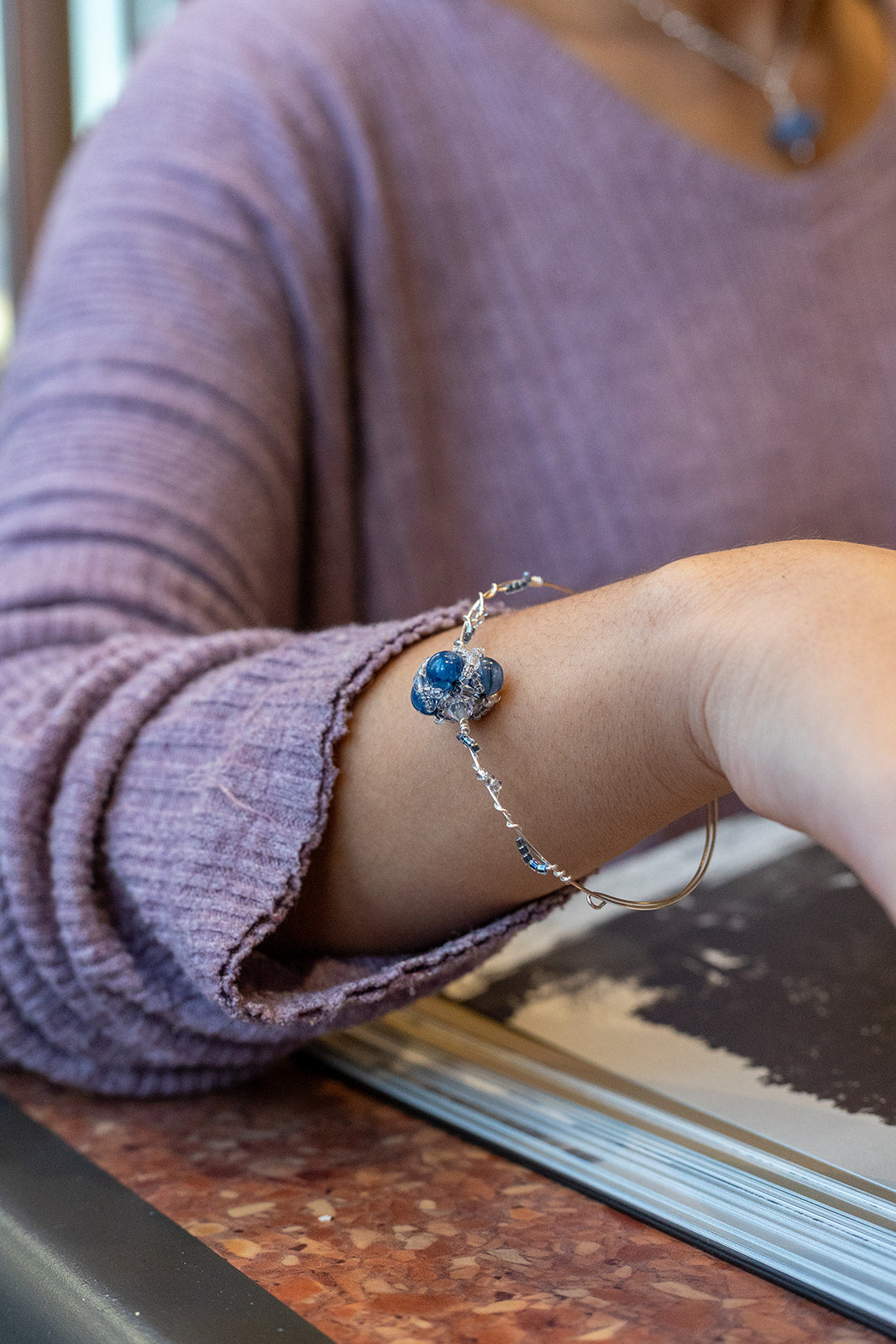Close up highlight of Mango Fish Inc. Blue Mood Beaded Bracelet Bracelet