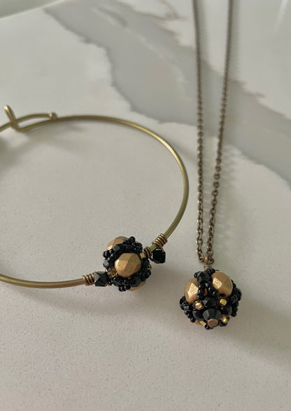 Black and Gold Hand beaded Tigress Bangle Bracelet and necklace by Mango Fish Inc. 