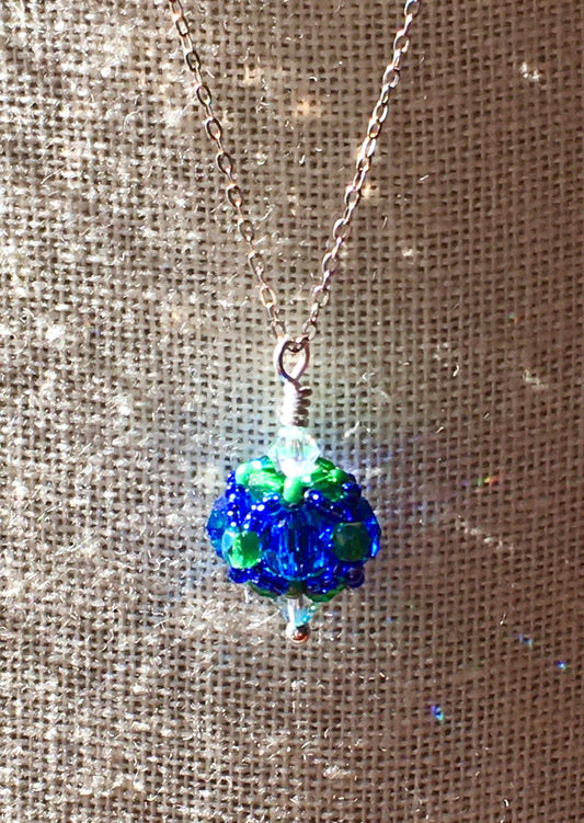 Blue and green glass beaded necklace representing the colors of Williston Northampton School