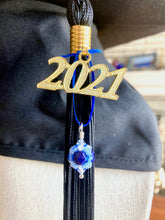 Load image into Gallery viewer, University of Maine Gifts -- Handcrafted Crystal &amp; Glass Proud of U.™ Graduation Cap Tassel Charm
